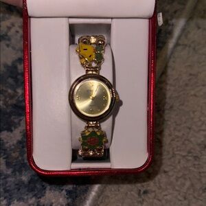 Elegant Gold Women's Watch with Floral Accents